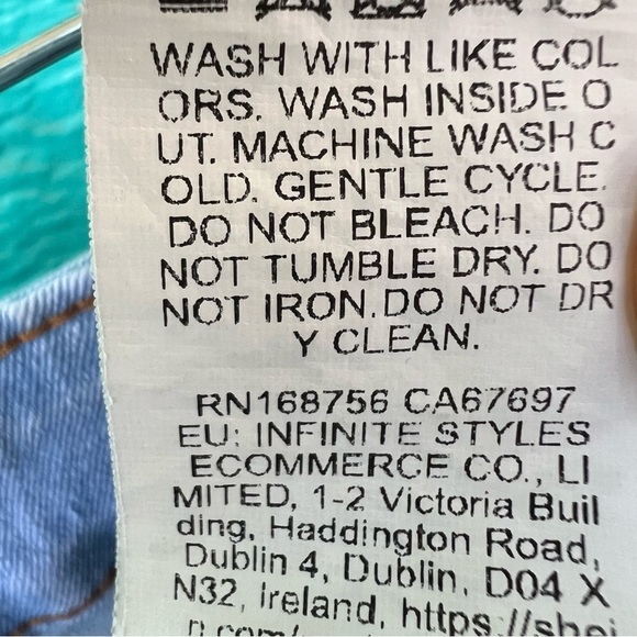 STRETCHY LIGHT WASH FLARE JEANS BUTTERFLY PRINT ON BOTTOM LEG SIZE 4X - Picture 5 of 8